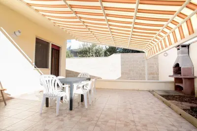 Image de Villa avec jardin, près de la plage de Baia di Torre Lapillo