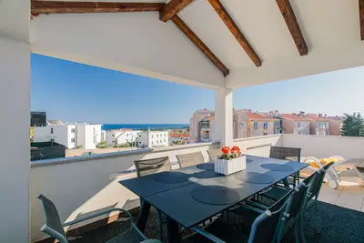 Image de Appartement LiJan °4 avec piscine d'eau salée chauffée et vue mer