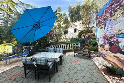 Image de Apartment Didi with private garden, close to the center, family-friendly