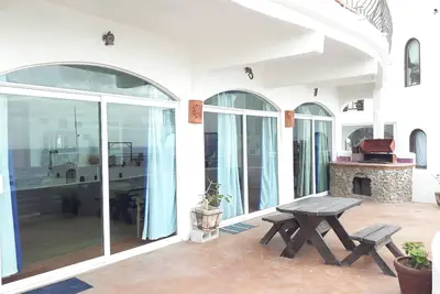 Image de Casa Vista Mar (piscine, jacuzzi, plage de sable, foyer et barbecue)