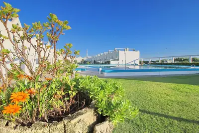 Image de Piscine et Tennis Beach House