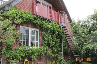 Image de Appartements meublés avec goût avec un jardin bien entretenu