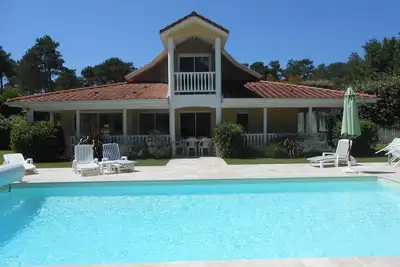 Image de Eden Parc 24 rue de Birdie 4 chambres, piscine chauffée, vue pinède