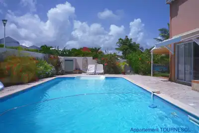 Image de Superbe appartement avec jardin et piscine privée, proche de la mer