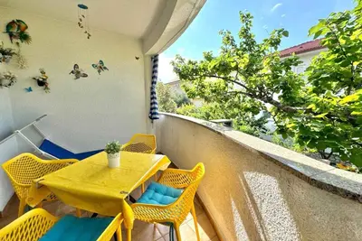 Image de Appartement de vacances avec de l'air conditionné et un accès Internet