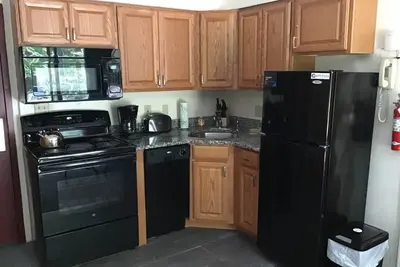 Image de En face de la base Lodge et des remontées mécaniques à Attitash