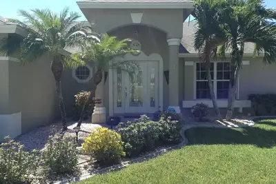 Image de Villa Palms South - Golfe Canal Accès Accueil Avec Piscine exposition sud-ouest