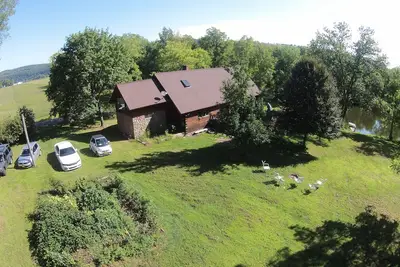 Image de Log Cabin-Chateau avec étang, natation / pêche et canoë