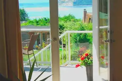 Image de Petit chalet 'Bibliothèque' avec Bunkroom! Vue et plage à Sunlight SeaScape