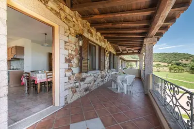 Image de Casa Pompia 1: maison de vacances de trois pièces entourée de verdure, 6 personnes