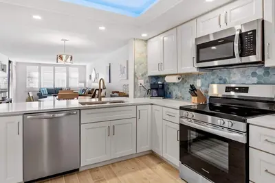 Image de Courte Marche À La Plage 🏝Loggerhead Cay 451🌸Clean Et Bright🐶🏖First Floor