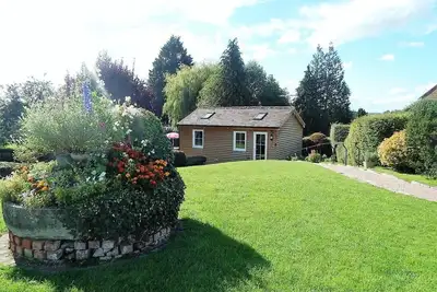 Image de Charmante cabane en rondins.