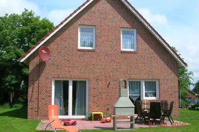 Image de maison individuelle avec grand jardin et aire de jeux, jusqu'à 8p, à 2 km de la mer du Nord