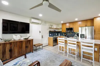 Image de Vue sur l'océan et les jardins tropicaux dans une propriété en bord de plage - Kihei Kai Unit 13