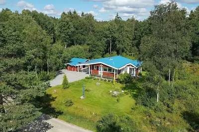Image de Maison confortable avec sa propre terrasse sur le lac