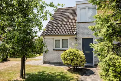 Maison de vacances dans un parc de vacances calme en Zélande directement sur la mer