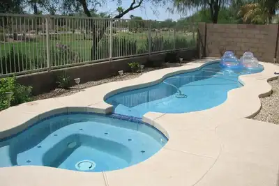 Image de 4 Chambre / 3 Bath avec piscine chauffée / spa à quelques minutes de The Goodyear Ballpark