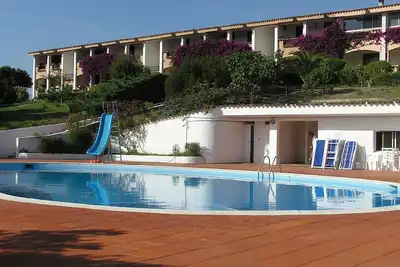 Image de Residence Pinnetta - Appartement 6 places avec piscine gratuite et Wi-Fi