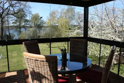 Image de Appartement avec jardin d'hiver et vue sur le lac - Ferienhof Löschebrand