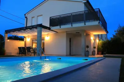 Image de Villa Divina avec piscine extérieure chauffée