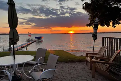 Image de Lac Missaukee avec quai, grue, plage de sable et couchers de soleil fabuleux