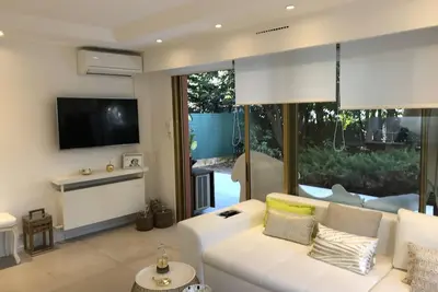 Image de Appartement Luxe 2 chambres avec jardin privé de 300m2 cerveau neuf