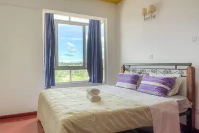 Image de Homely Roost 'Une maison dans la partie supérieure sereine, sûre et charmante de Nairobi.