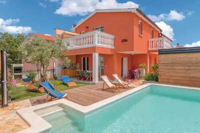 Image de Belle maison à Barbariga avec WiFi