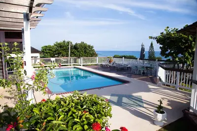 Image de Sol Mar Villa-Silver Sands, vue sur l'océan, piscine, salle à manger en plein air, familial