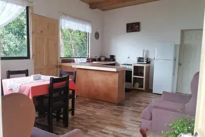 Image de Sunset House au-dessus de Rainbow House