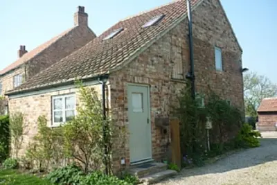 Image de Ancienne grange aménagée en bordure du village