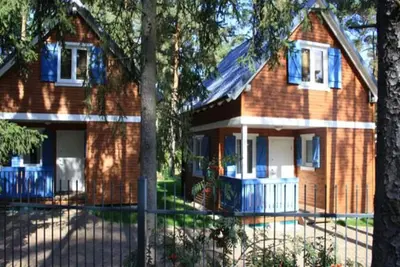 Image de maison de vacances adaptée aux enfants à Pobierowo, W-Lan, situé au centre, à 400m de la plage