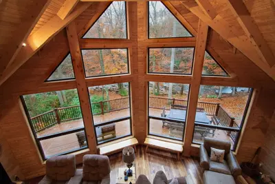 Image de Stream Front Log Home près de 7 sources, 4 Br