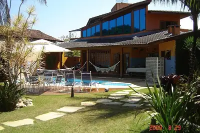 Image de Maison de luxe, Cond fermé Costa do Sol Piscine, 1 pâté de maisons de la plage de Guaratuba