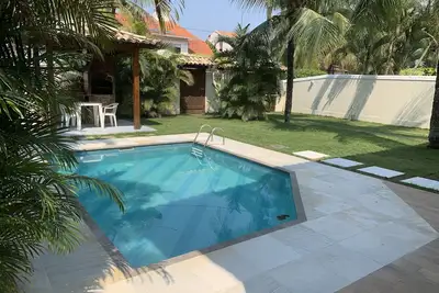 Image de Maison 2 pâtés de maisons de la plage 4 qtos piscine Wi-Fi barbecue <br>