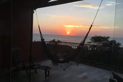 Image de Maison avec vue panoramique sur Praia do Rosa à 250 mètres de la mer