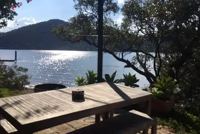 Image de Mackys. arriver par bateau. Hawkesbury River. Kayaks au bord de l'eau. Jetée privée