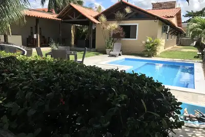 Image de plage de moutons, maison de 4 chambres avec piscine, barbecue, tout meublé.