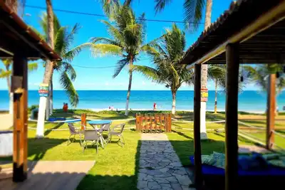 Image de Beira Mar Beach House en copropriété avec espace de loisirs (parc et cour)