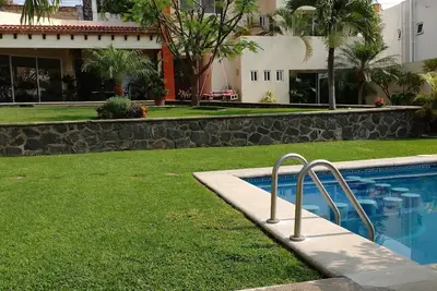Image de casa flor de mayo idéal pour descansar y divertirse con la familia o con amigos.
