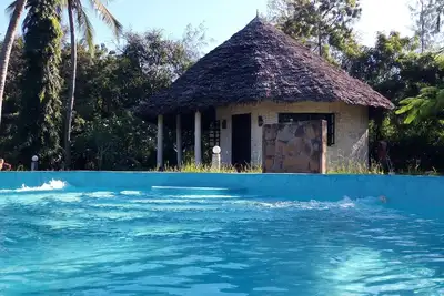 Image de Magnifique Cottage privé avec un grand lit et terrasse + piscine et vue sur le jardin