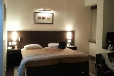 Image de Une chambre avec salle de bains privée, Salon et Kitchen Studio Appartment