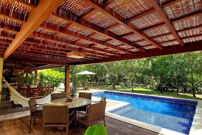 Image de Maison 4 suites à Praia do Forte, près de la plage et du village.