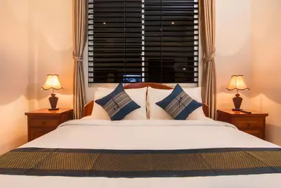 Image de Angkor Sunshine est une villa privée au premier étage avec 3 chambres, un grand coin salon.