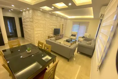 Image de Elite Residence - Appartement entièrement meublé confortable et chaleureux.