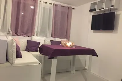 Image de Beach Side Petite Apartment, un endroit pour régler votre horloge à l'heure de la plage!