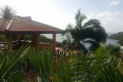 Image de Une incroyable villa de 3 chambres Ă la Grenade avec vue sur la mer du capitaine!