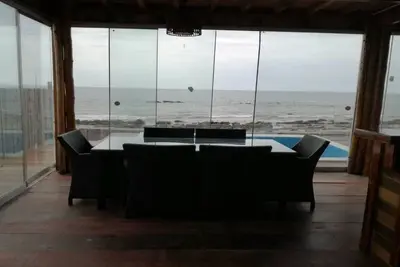Image de Casa frente al mar avec piscina privada, completamente equipada y amoblada.