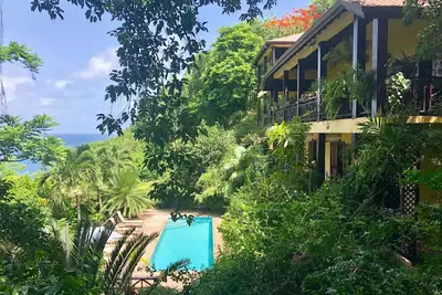 Image de Villa Pomme D'Amour À Marigot 1er Niveau De Maison Principale 3 Min À Pied De Cove Calme