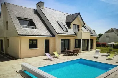 Image de Maison 12 personnes en bord de mer, climatisée, avec piscine chauffée.